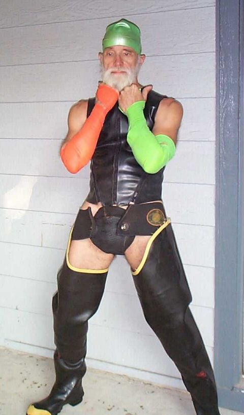 Yellow-trimmed boots and latex arm wraps