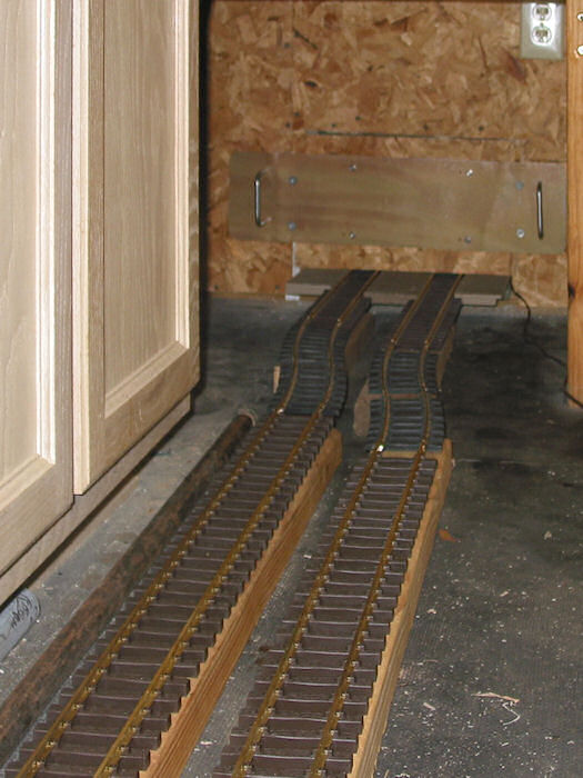 Rubber Room Tracks blocked by Closed Garage Portal
